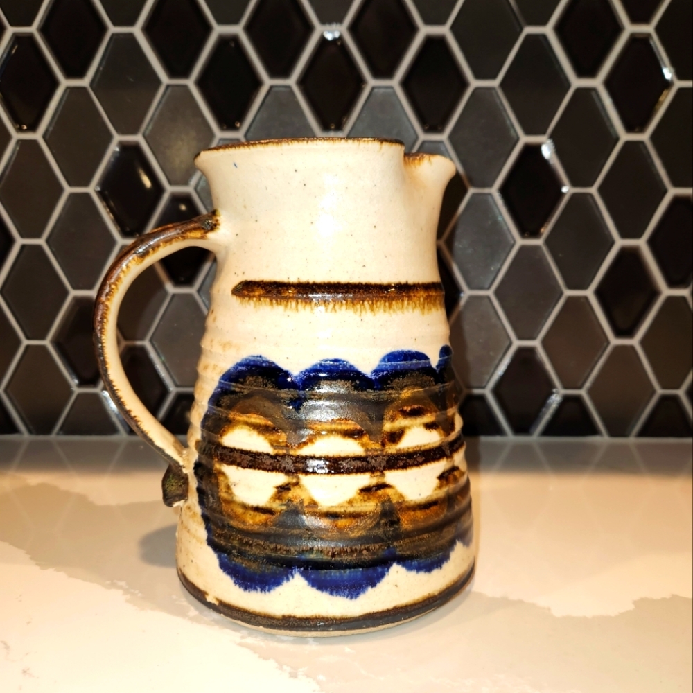 Fred Evangel pottery pitcher